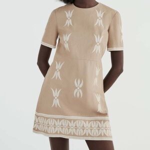 Zara Tan and White Dress